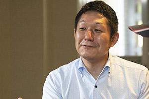 A living coordinator whose job is to support the building managers