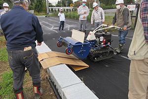 Landowners discussing how to proceed grass cutting