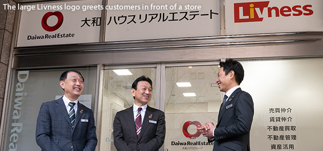 The large Livness logo greets customers in front of a store