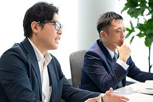 Katayama, a member of the sales team, proposes the next phase of project