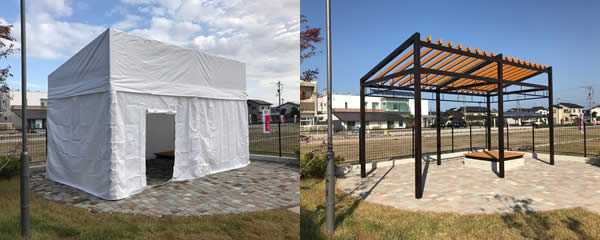 The pergolas can be fitted with covers as shown in the photograph at left, enabling their use as first-aid stations or sorting areas for relief supplies following a natural disaster.