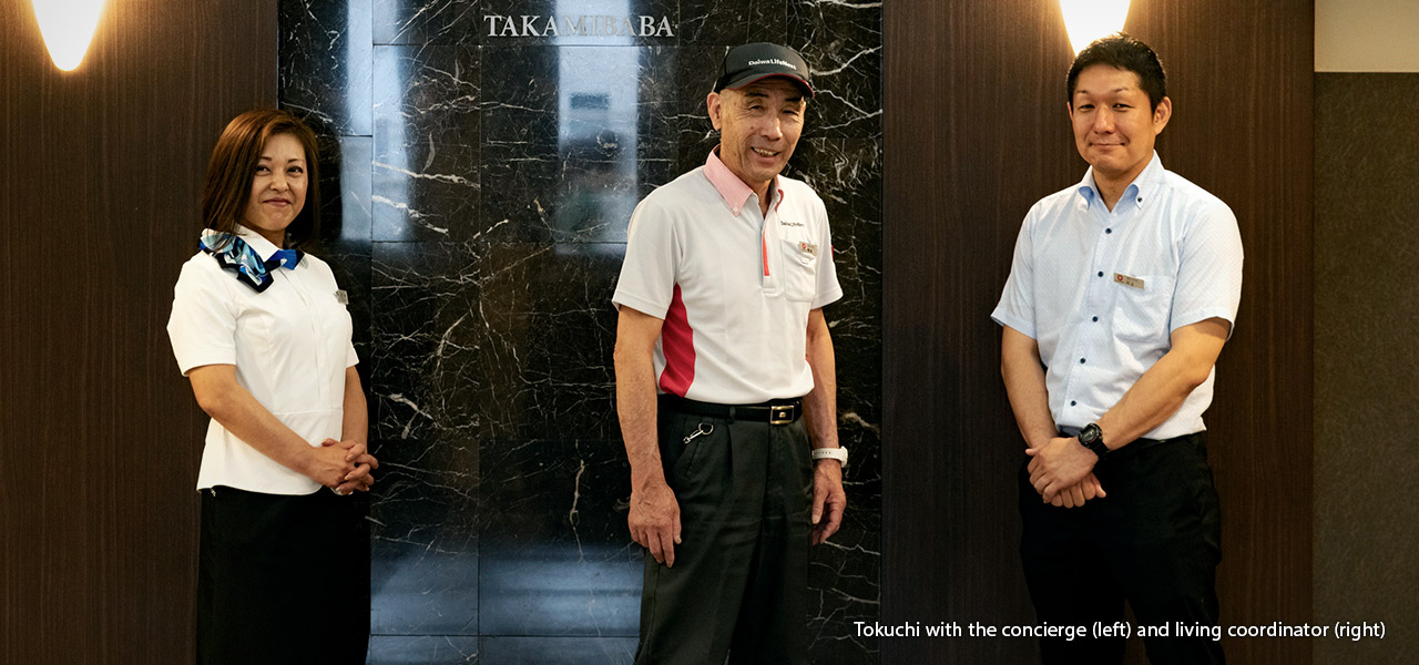 Tokuchi with the concierge (left) and living coordinator (right)