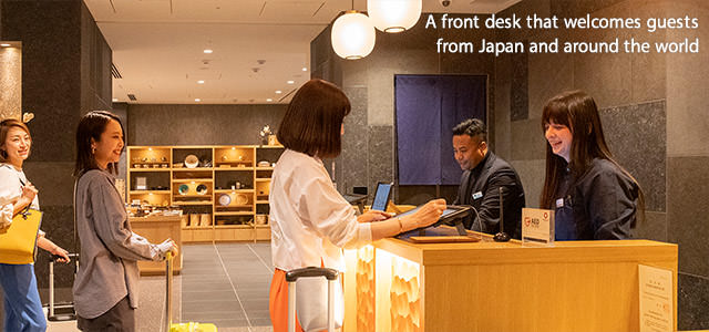 A front desk that welcomes guests from Japan and around the world